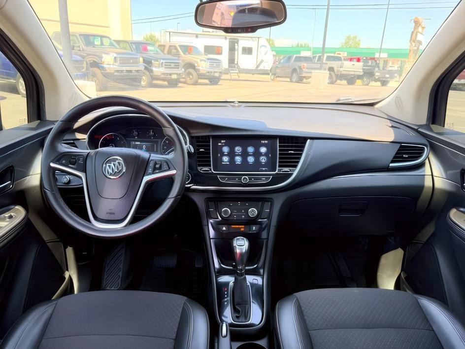2018 GOLD /Ebony Buick Encore (KL4CJESB7JB) with an ECOTEC 14L I-4 DOHC engine, Automatic transmission, located at 1175 N Woodruff Ave, Idaho Falls, ID, 83401, 43.506901, -111.999657 - At Timberline Auto, finding a great deal on your next vehicle is always easy! Our experienced sales staff goal is to help find you the right vehicle at the right price! Our knowledgeable finance department has options for almost any credit score. We offer extended service contract options to prot- Photo#24