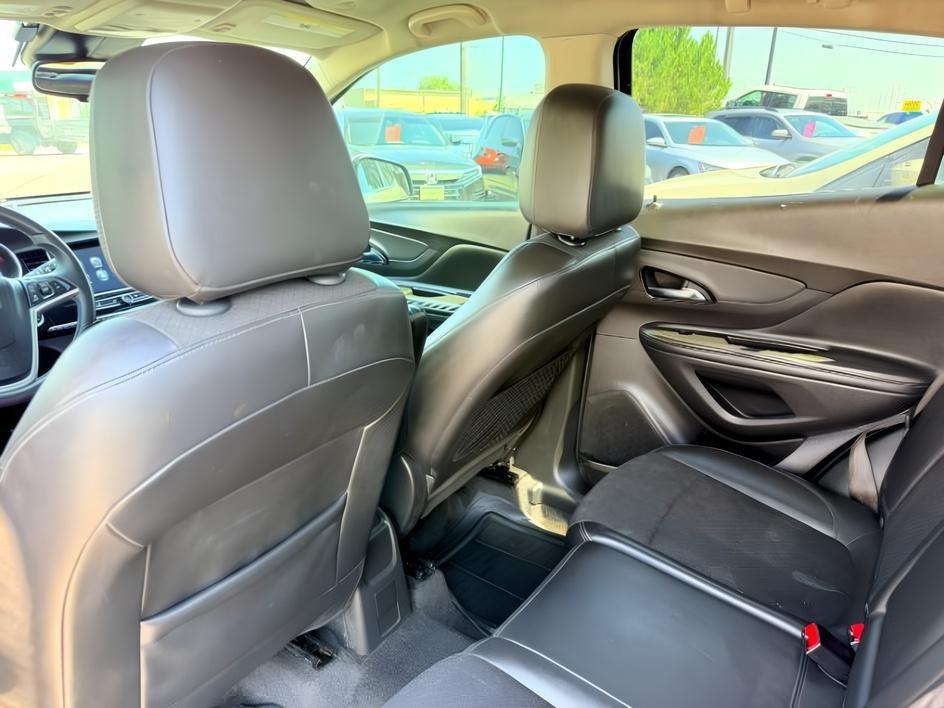 2018 GOLD /Ebony Buick Encore (KL4CJESB7JB) with an ECOTEC 14L I-4 DOHC engine, Automatic transmission, located at 1175 N Woodruff Ave, Idaho Falls, ID, 83401, 43.506901, -111.999657 - At Timberline Auto, finding a great deal on your next vehicle is always easy! Our experienced sales staff goal is to help find you the right vehicle at the right price! Our knowledgeable finance department has options for almost any credit score. We offer extended service contract options to prot- Photo#25