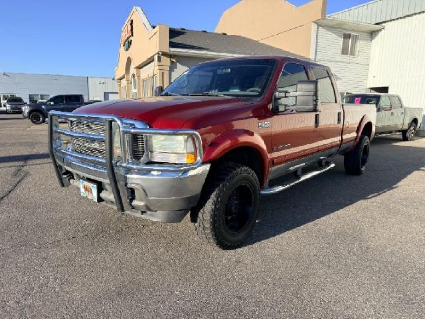 2002 RED /Medium Flint Ford F-350 (1FTSW31F92E) with an Powerstroke 73L V-8 diesel direct injection engine, Automatic transmission, located at 1175 N Woodruff Ave, Idaho Falls, ID, 83401, 43.506901, -111.999657 - At Timberline Auto, finding a great deal on your next vehicle is always easy! Our experienced sales staff goal is to help find you the right vehicle at the right price! Our knowledgeable finance department has options for almost any credit score. We offer extended service contract options to prot- Photo#25