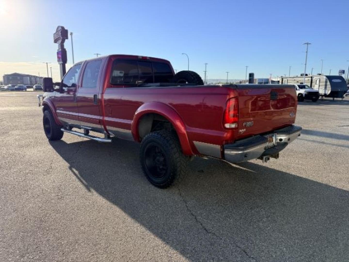 2002 RED /Medium Flint Ford F-350 (1FTSW31F92E) with an Powerstroke 73L V-8 diesel direct injection engine, Automatic transmission, located at 1175 N Woodruff Ave, Idaho Falls, ID, 83401, 43.506901, -111.999657 - At Timberline Auto, finding a great deal on your next vehicle is always easy! Our experienced sales staff goal is to help find you the right vehicle at the right price! Our knowledgeable finance department has options for almost any credit score. We offer extended service contract options to prot- Photo#27
