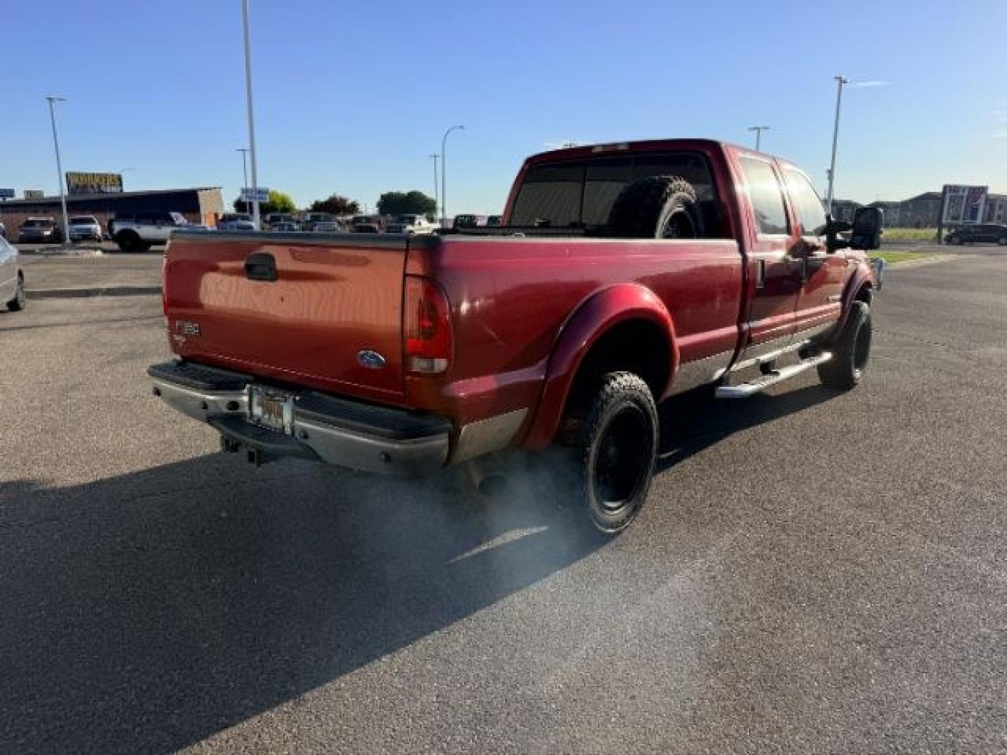 2002 RED /Medium Flint Ford F-350 (1FTSW31F92E) with an Powerstroke 73L V-8 diesel direct injection engine, Automatic transmission, located at 1175 N Woodruff Ave, Idaho Falls, ID, 83401, 43.506901, -111.999657 - At Timberline Auto, finding a great deal on your next vehicle is always easy! Our experienced sales staff goal is to help find you the right vehicle at the right price! Our knowledgeable finance department has options for almost any credit score. We offer extended service contract options to prot- Photo#29