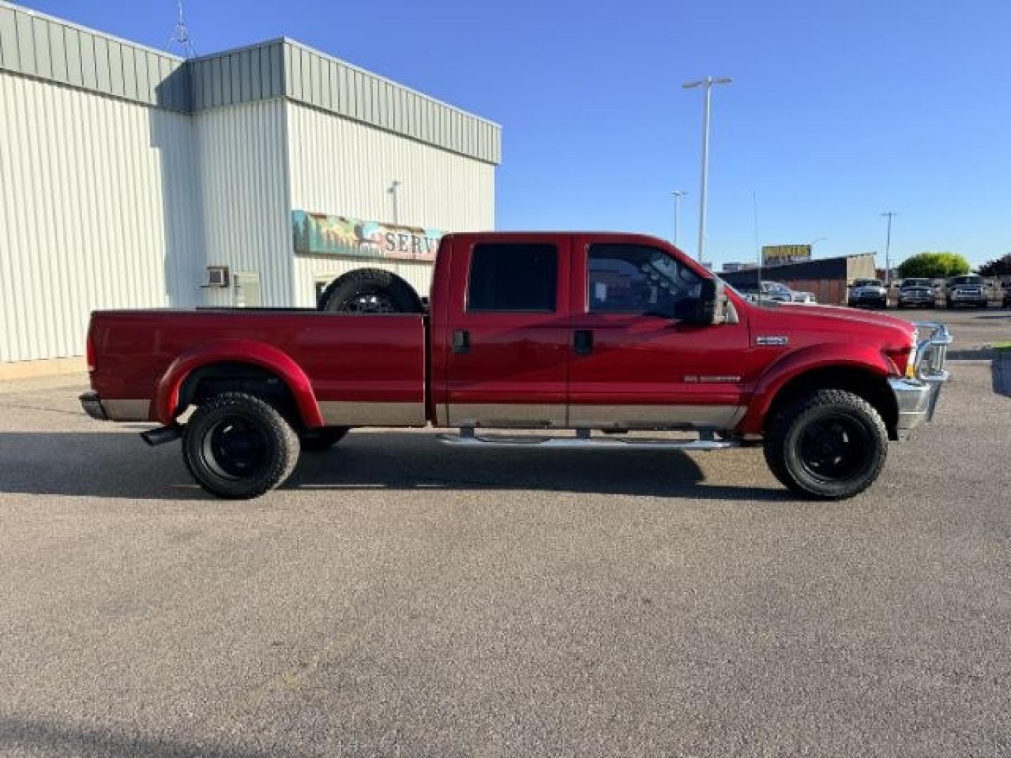 2002 RED /Medium Flint Ford F-350 (1FTSW31F92E) with an Powerstroke 73L V-8 diesel direct injection engine, Automatic transmission, located at 1175 N Woodruff Ave, Idaho Falls, ID, 83401, 43.506901, -111.999657 - At Timberline Auto, finding a great deal on your next vehicle is always easy! Our experienced sales staff goal is to help find you the right vehicle at the right price! Our knowledgeable finance department has options for almost any credit score. We offer extended service contract options to prot- Photo#30