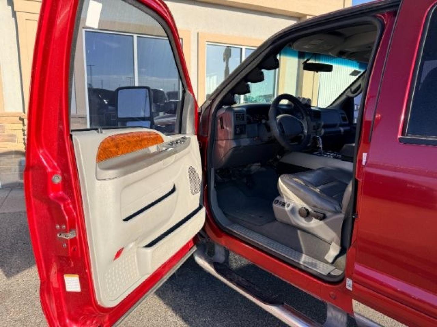 2002 RED /Medium Flint Ford F-350 (1FTSW31F92E) with an Powerstroke 73L V-8 diesel direct injection engine, Automatic transmission, located at 1175 N Woodruff Ave, Idaho Falls, ID, 83401, 43.506901, -111.999657 - At Timberline Auto, finding a great deal on your next vehicle is always easy! Our experienced sales staff goal is to help find you the right vehicle at the right price! Our knowledgeable finance department has options for almost any credit score. We offer extended service contract options to prot- Photo#35
