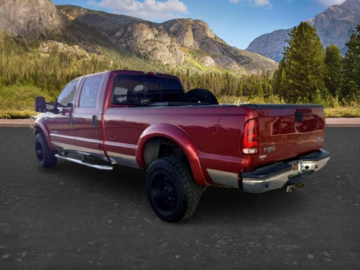 2002 RED /Medium Flint Ford F-350 (1FTSW31F92E) with an Powerstroke 73L V-8 diesel direct injection engine, Automatic transmission, located at 1175 N Woodruff Ave, Idaho Falls, ID, 83401, 43.506901, -111.999657 - At Timberline Auto, finding a great deal on your next vehicle is always easy! Our experienced sales staff goal is to help find you the right vehicle at the right price! Our knowledgeable finance department has options for almost any credit score. We offer extended service contract options to prot- Photo#2