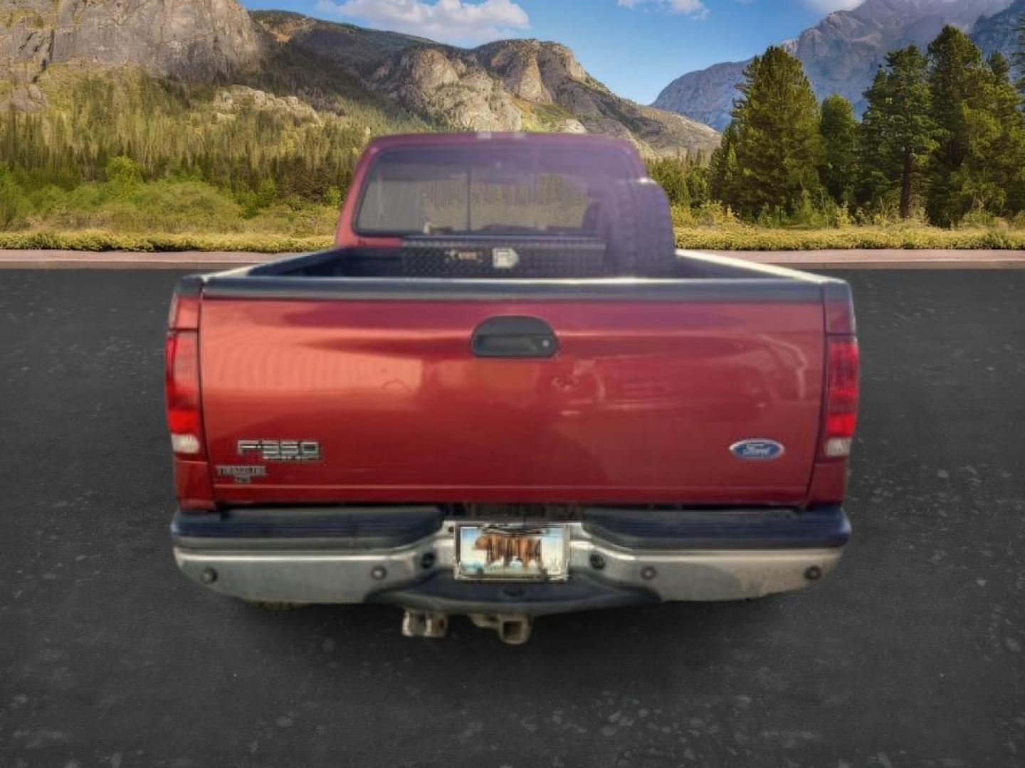 2002 RED /Medium Flint Ford F-350 (1FTSW31F92E) with an Powerstroke 73L V-8 diesel direct injection engine, Automatic transmission, located at 1175 N Woodruff Ave, Idaho Falls, ID, 83401, 43.506901, -111.999657 - At Timberline Auto, finding a great deal on your next vehicle is always easy! Our experienced sales staff goal is to help find you the right vehicle at the right price! Our knowledgeable finance department has options for almost any credit score. We offer extended service contract options to prot- Photo#3