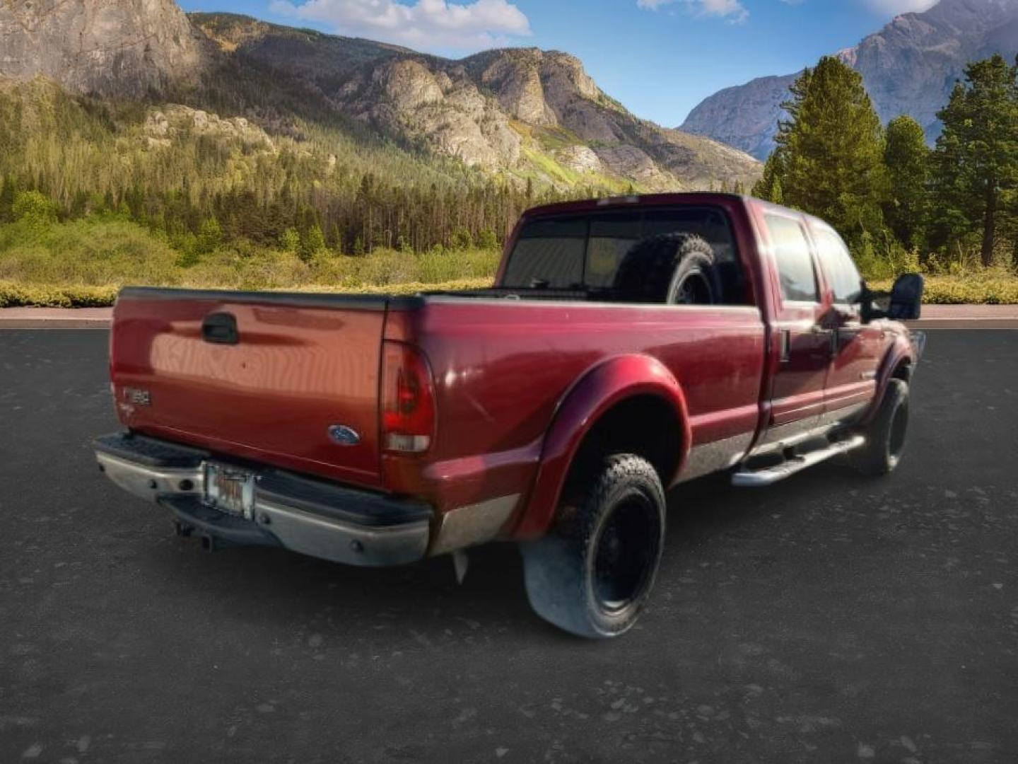 2002 RED /Medium Flint Ford F-350 (1FTSW31F92E) with an Powerstroke 73L V-8 diesel direct injection engine, Automatic transmission, located at 1175 N Woodruff Ave, Idaho Falls, ID, 83401, 43.506901, -111.999657 - At Timberline Auto, finding a great deal on your next vehicle is always easy! Our experienced sales staff goal is to help find you the right vehicle at the right price! Our knowledgeable finance department has options for almost any credit score. We offer extended service contract options to prot- Photo#4