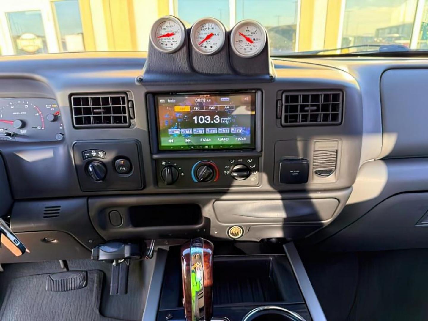 2002 RED /Medium Flint Ford F-350 (1FTSW31F92E) with an Powerstroke 73L V-8 diesel direct injection engine, Automatic transmission, located at 1175 N Woodruff Ave, Idaho Falls, ID, 83401, 43.506901, -111.999657 - At Timberline Auto, finding a great deal on your next vehicle is always easy! Our experienced sales staff goal is to help find you the right vehicle at the right price! Our knowledgeable finance department has options for almost any credit score. We offer extended service contract options to prot- Photo#14