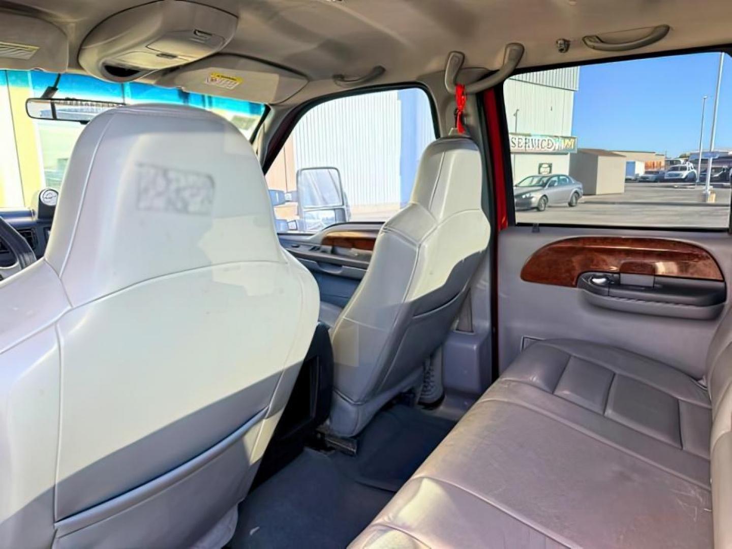 2002 RED /Medium Flint Ford F-350 (1FTSW31F92E) with an Powerstroke 73L V-8 diesel direct injection engine, Automatic transmission, located at 1175 N Woodruff Ave, Idaho Falls, ID, 83401, 43.506901, -111.999657 - At Timberline Auto, finding a great deal on your next vehicle is always easy! Our experienced sales staff goal is to help find you the right vehicle at the right price! Our knowledgeable finance department has options for almost any credit score. We offer extended service contract options to prot- Photo#23