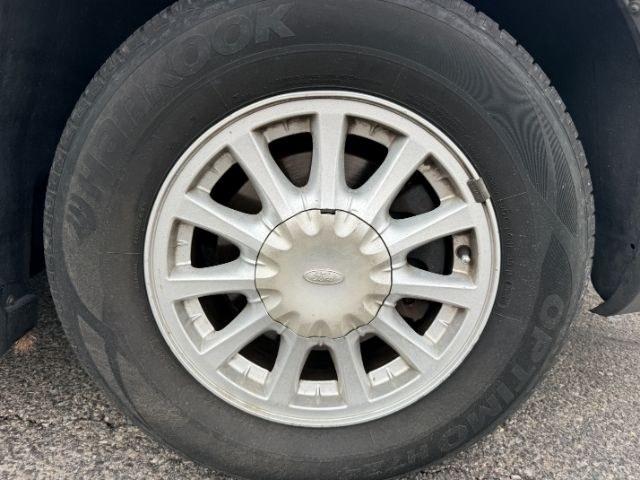 2001 SILVER /Medium Graphite Ford Windstar (2FMZA51451B) with an 38L V-6 regular unleaded engine, Automatic transmission, located at 1175 N Woodruff Ave, Idaho Falls, ID, 83401, 43.506901, -111.999657 - At Timberline Auto, finding a great deal on your next vehicle is always easy! Our experienced sales staff goal is to help find you the right vehicle at the right price! Our knowledgeable finance department has options for almost any credit score. We offer extended service contract options to prot- Photo#35