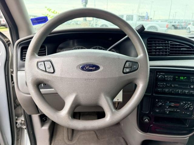 2001 SILVER /Medium Graphite Ford Windstar (2FMZA51451B) with an 38L V-6 regular unleaded engine, Automatic transmission, located at 1175 N Woodruff Ave, Idaho Falls, ID, 83401, 43.506901, -111.999657 - At Timberline Auto, finding a great deal on your next vehicle is always easy! Our experienced sales staff goal is to help find you the right vehicle at the right price! Our knowledgeable finance department has options for almost any credit score. We offer extended service contract options to prot- Photo#39
