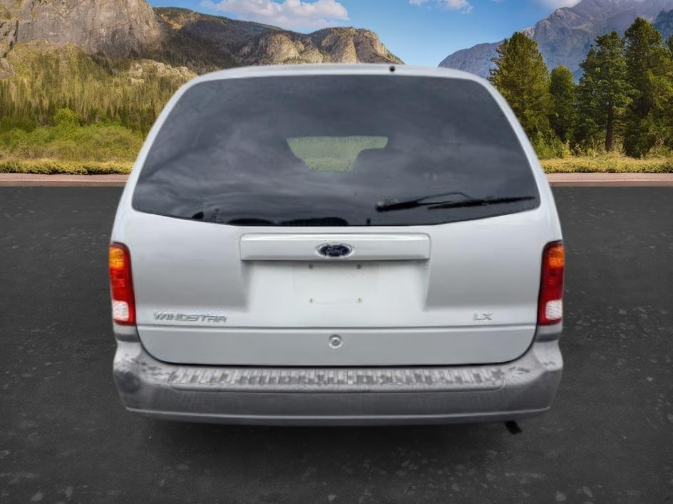 2001 SILVER /Medium Graphite Ford Windstar (2FMZA51451B) with an 38L V-6 regular unleaded engine, Automatic transmission, located at 1175 N Woodruff Ave, Idaho Falls, ID, 83401, 43.506901, -111.999657 - At Timberline Auto, finding a great deal on your next vehicle is always easy! Our experienced sales staff goal is to help find you the right vehicle at the right price! Our knowledgeable finance department has options for almost any credit score. We offer extended service contract options to prot- Photo#3