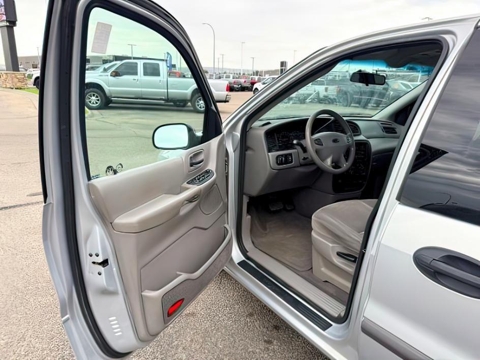 2001 SILVER /Medium Graphite Ford Windstar (2FMZA51451B) with an 38L V-6 regular unleaded engine, Automatic transmission, located at 1175 N Woodruff Ave, Idaho Falls, ID, 83401, 43.506901, -111.999657 - At Timberline Auto, finding a great deal on your next vehicle is always easy! Our experienced sales staff goal is to help find you the right vehicle at the right price! Our knowledgeable finance department has options for almost any credit score. We offer extended service contract options to prot- Photo#12