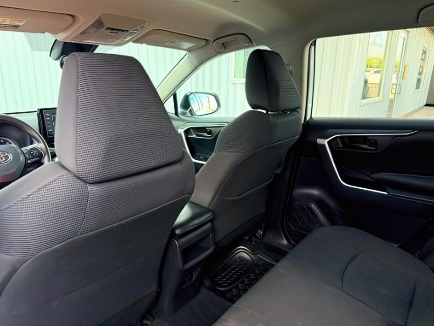 2021 Super White /Black Toyota RAV4 (2T3F1RFVXMW) with an Dynamic Force 25L I-4 portdirect injection engine, Automatic transmission, located at 1175 N Woodruff Ave, Idaho Falls, ID, 83401, 43.506901, -111.999657 - At Timberline Auto, finding a great deal on your next vehicle is always easy! Our experienced sales staff goal is to help find you the right vehicle at the right price! Our knowledgeable finance department has options for almost any credit score. We offer extended service contract options to prot- Photo#27