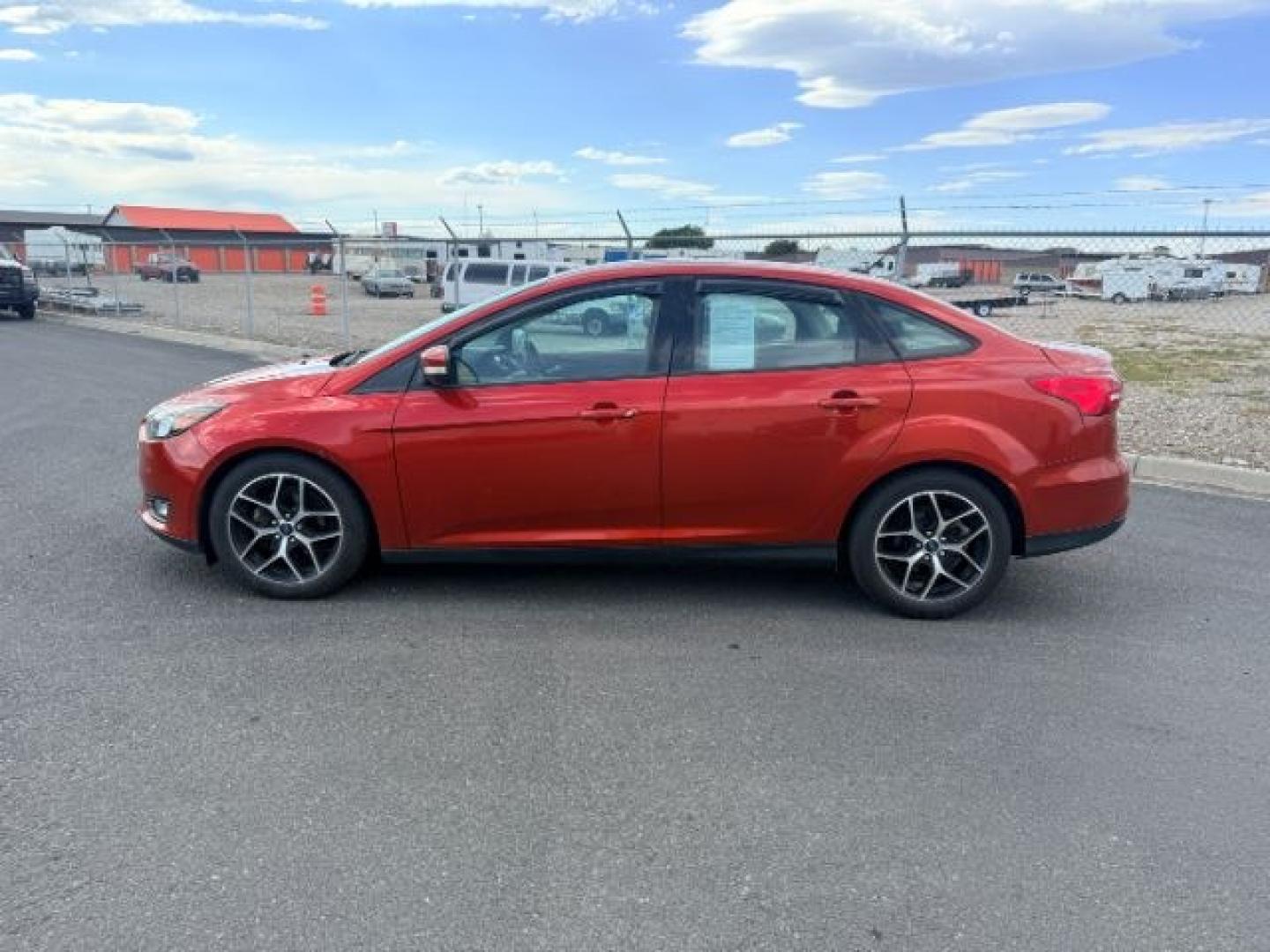 2018 ORANGE /LEATHER Ford Focus (1FADP3H22JL) with an 20L engine, Automatic transmission, located at 1175 N Woodruff Ave, Idaho Falls, ID, 83401, 43.506901, -111.999657 - At Timberline Auto, finding a great deal on your next vehicle is always easy! Our experienced sales staff goal is to help find you the right vehicle at the right price! Our knowledgeable finance department has options for almost any credit score. We offer extended service contract options to prot- Photo#1