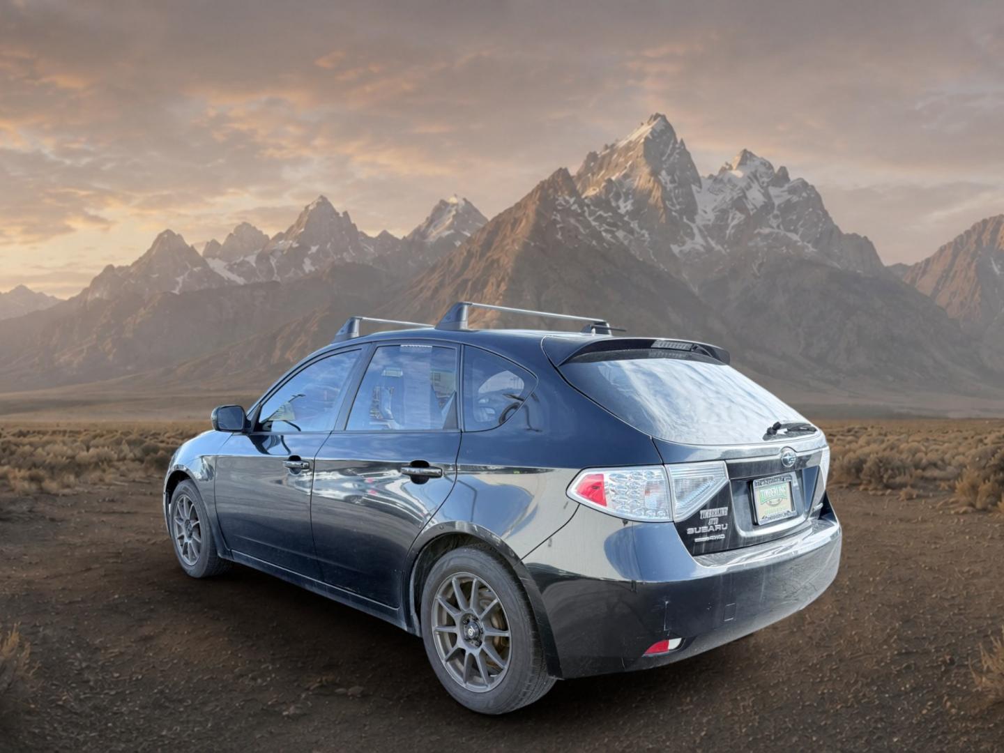 2011 Obsidian Black Pearl /Ivory Subaru Impreza 2.5i (JF1GH6A62BG) with an 4 Cyl, 2.5L engine, 5-speed manual transmission, located at 1175 N Woodruff Ave, Idaho Falls, ID, 83401, 43.506901, -111.999657 - <b>Vehicle Details</b><br>Looking for a dependable sedan with confident capability and sporty style? This pre-owned 2011 Subaru Impreza 2.5i is ready to impress in Idaho Falls, ID. Powered by a 4-cylinder, 2.5L gasoline engine and Subaru's trusted AWD system, this Subaru Impreza delivers surefooted- Photo#2