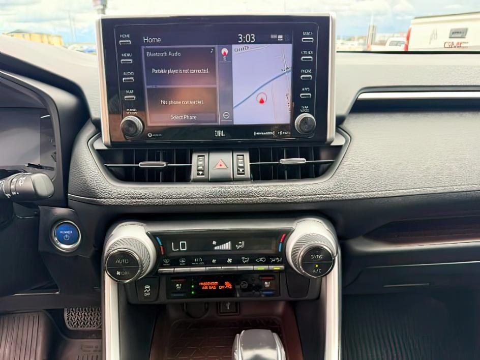 2021 GRAY /Black Toyota RAV4 Hybrid Limited (2T3D6RFV3MW) with an Dynamic Force 2.5L I-4 port/direct injection engine, AUTOMATIC transmission, located at 1235 N Woodruff Ave., Idaho Falls, 83401, (208) 523-1053, 43.507172, -112.000488 - At Timberline Auto, finding a great deal on your next vehicle is always easy! Our experienced sales staff goal is to help find you the right vehicle at the right price! Our knowledgeable finance department has options for almost any credit score. We offer extended service contract options to prot- Photo#16