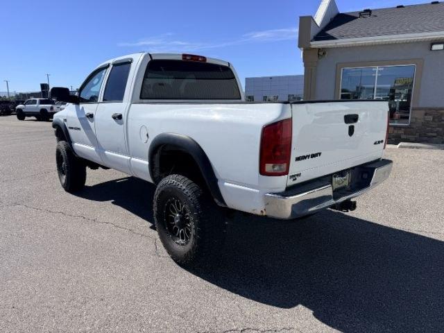 2006 WHITE /Medium Slate Gray Cloth Interior Dodge Ram 2500 ST Quad Cab 4WD (1D7KS28D56J) with an 5.7L V8 OHV 16V engine, 4-Speed Automatic transmission, located at 1235 N Woodruff Ave., Idaho Falls, 83401, (208) 523-1053, 43.507172, -112.000488 - At Timberline Auto, finding a great deal on your next vehicle is always easy! Our experienced sales staff goal is to help find you the right vehicle at the right price! Our knowledgeable finance department has options for almost any credit score. We offer extended service contract options to prot- Photo#2