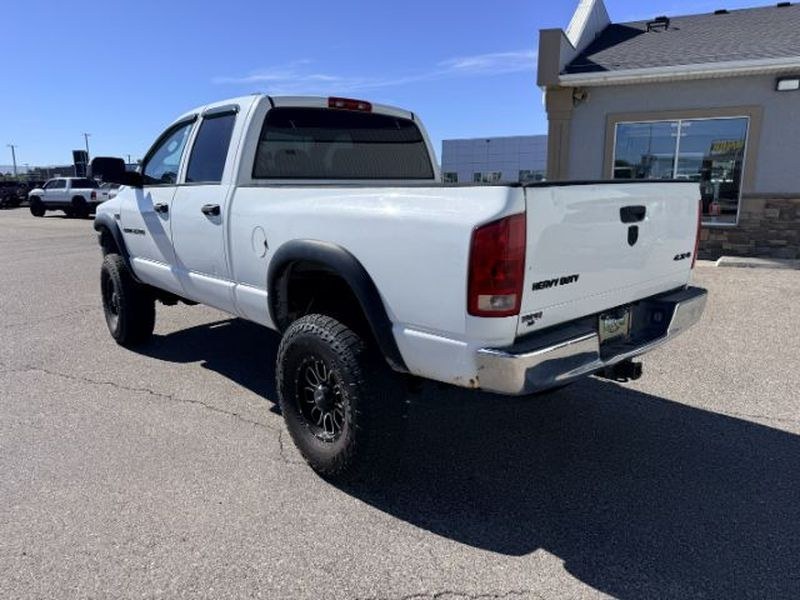 2006 WHITE /Medium Slate Gray Dodge Ram Pickup ST (1D7KS28D56J) with an V8, 5.7L engine, 6-speed manual transmission, located at 1175 N Woodruff Ave, Idaho Falls, ID, 83401, 43.506901, -111.999657 - <b>Vehicle Details</b><br>Get ready to tackle tough jobs and weekend adventures in this **2006 Dodge Ram Pickup 2500 ST Quad Cab 4WD**. Built with legendary Dodge strength and powered by a **V8 5.7L Gasoline engine**, this heavy-duty pickup delivers the capability, confidence, and rugged style drive- Photo#2