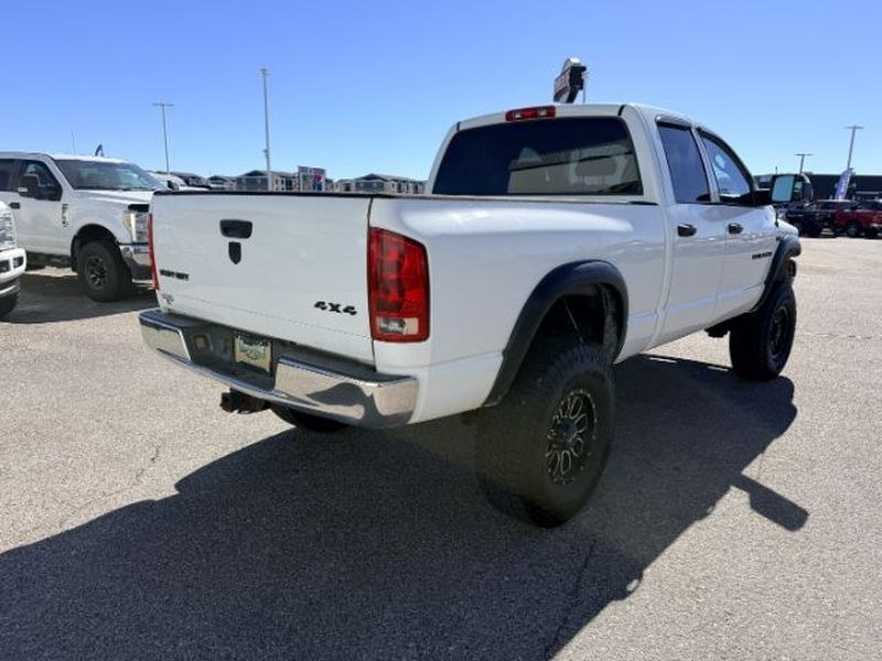 2006 WHITE /Medium Slate Gray Dodge Ram Pickup ST (1D7KS28D56J) with an V8, 5.7L engine, 6-speed manual transmission, located at 1175 N Woodruff Ave, Idaho Falls, ID, 83401, 43.506901, -111.999657 - <b>Vehicle Details</b><br>Get ready to tackle tough jobs and weekend adventures in this **2006 Dodge Ram Pickup 2500 ST Quad Cab 4WD**. Built with legendary Dodge strength and powered by a **V8 5.7L Gasoline engine**, this heavy-duty pickup delivers the capability, confidence, and rugged style drive- Photo#5
