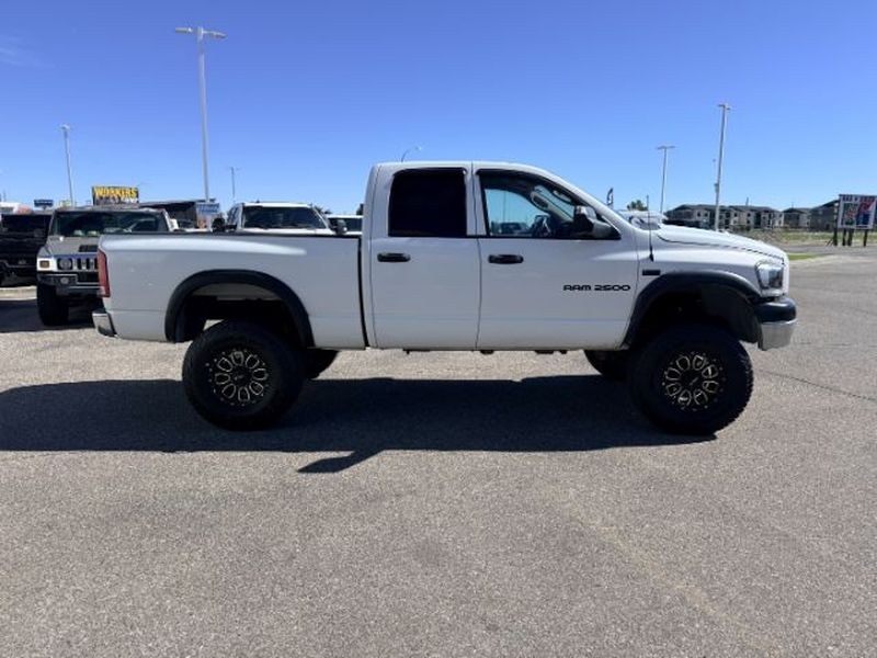 2006 WHITE /Medium Slate Gray Dodge Ram Pickup ST (1D7KS28D56J) with an V8, 5.7L engine, 6-speed manual transmission, located at 1175 N Woodruff Ave, Idaho Falls, ID, 83401, 43.506901, -111.999657 - <b>Vehicle Details</b><br>Get ready to tackle tough jobs and weekend adventures in this **2006 Dodge Ram Pickup 2500 ST Quad Cab 4WD**. Built with legendary Dodge strength and powered by a **V8 5.7L Gasoline engine**, this heavy-duty pickup delivers the capability, confidence, and rugged style drive- Photo#6