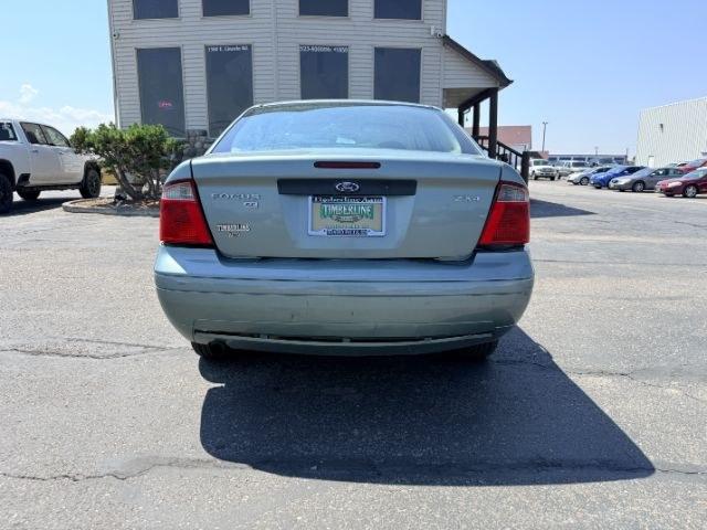 2005 GREEN /CLOTH Ford Focus (1FAFP34N35W) with an 20L I4 engine, Automatic transmission, located at 1175 N Woodruff Ave, Idaho Falls, ID, 83401, 43.506901, -111.999657 - At Timberline Auto, finding a great deal on your next vehicle is always easy! Our experienced sales staff goal is to help find you the right vehicle at the right price! Our knowledgeable finance department has options for almost any credit score. We offer extended service contract options to prot- Photo#19