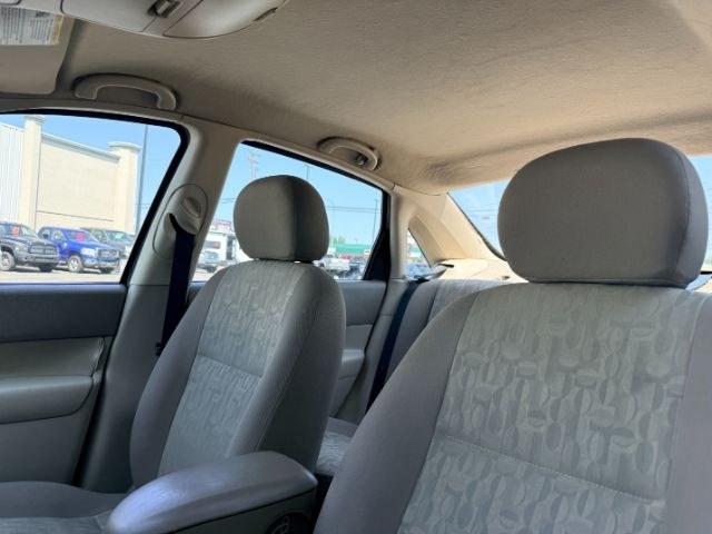 2005 GREEN /CLOTH Ford Focus (1FAFP34N35W) with an 20L I4 engine, Automatic transmission, located at 1175 N Woodruff Ave, Idaho Falls, ID, 83401, 43.506901, -111.999657 - At Timberline Auto, finding a great deal on your next vehicle is always easy! Our experienced sales staff goal is to help find you the right vehicle at the right price! Our knowledgeable finance department has options for almost any credit score. We offer extended service contract options to prot- Photo#31