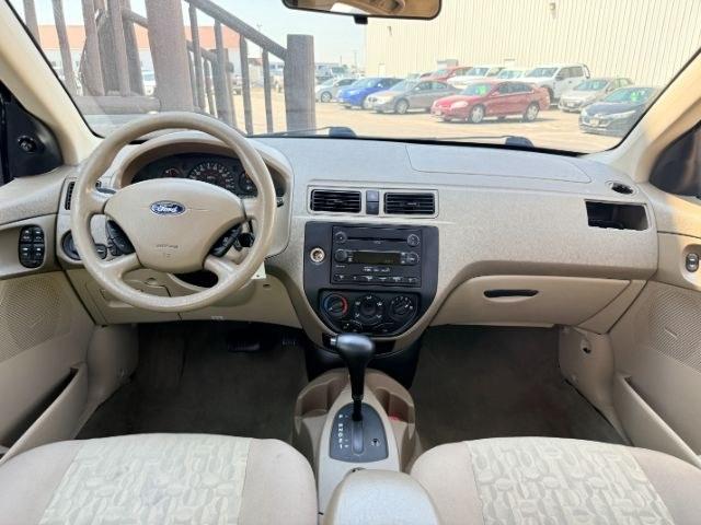 2005 GREEN /CLOTH Ford Focus (1FAFP34N35W) with an 20L I4 engine, Automatic transmission, located at 1175 N Woodruff Ave, Idaho Falls, ID, 83401, 43.506901, -111.999657 - At Timberline Auto, finding a great deal on your next vehicle is always easy! Our experienced sales staff goal is to help find you the right vehicle at the right price! Our knowledgeable finance department has options for almost any credit score. We offer extended service contract options to prot- Photo#33