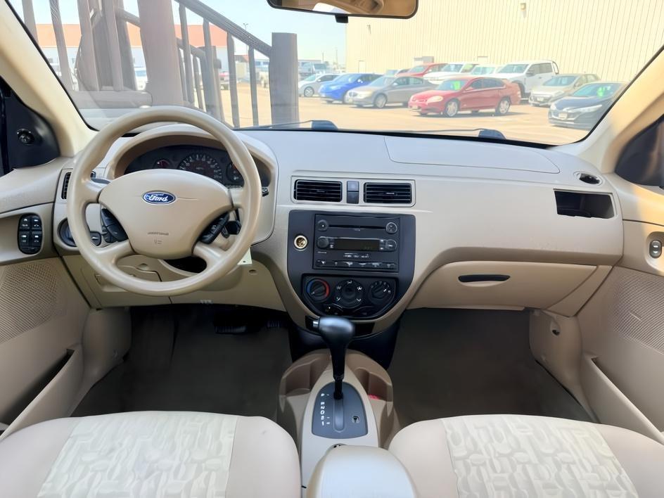 2005 GREEN /CLOTH Ford Focus (1FAFP34N35W) with an 20L I4 engine, Automatic transmission, located at 1175 N Woodruff Ave, Idaho Falls, ID, 83401, 43.506901, -111.999657 - At Timberline Auto, finding a great deal on your next vehicle is always easy! Our experienced sales staff goal is to help find you the right vehicle at the right price! Our knowledgeable finance department has options for almost any credit score. We offer extended service contract options to prot- Photo#15
