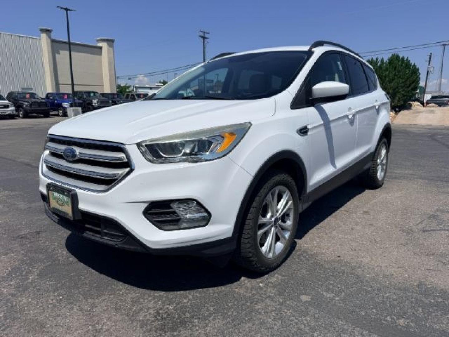 2018 WHITE /Medium Light Stone Ford Escape (1FMCU9HD1JU) with an EcoBoost 15L I-4 gasoline direct injection engine, Automatic transmission, located at 1175 N Woodruff Ave, Idaho Falls, ID, 83401, 43.506901, -111.999657 - At Timberline Auto, finding a great deal on your next vehicle is always easy! Our experienced sales staff goal is to help find you the right vehicle at the right price! Our knowledgeable finance department has options for almost any credit score. We offer extended service contract options to prot- Photo#28