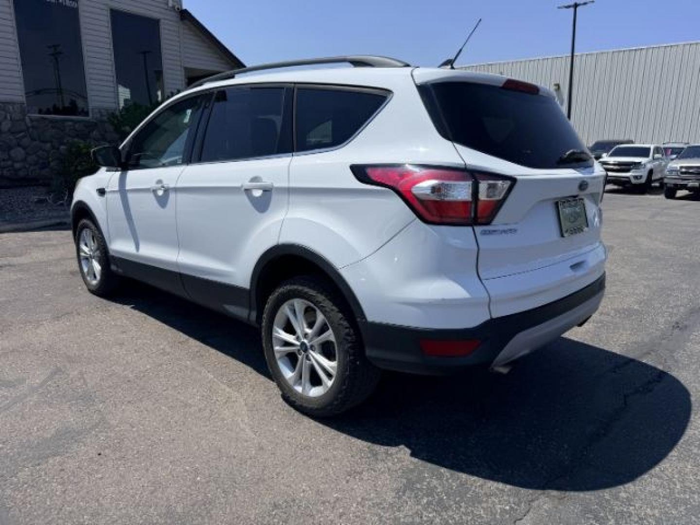 2018 WHITE /Medium Light Stone Ford Escape (1FMCU9HD1JU) with an EcoBoost 15L I-4 gasoline direct injection engine, Automatic transmission, located at 1175 N Woodruff Ave, Idaho Falls, ID, 83401, 43.506901, -111.999657 - At Timberline Auto, finding a great deal on your next vehicle is always easy! Our experienced sales staff goal is to help find you the right vehicle at the right price! Our knowledgeable finance department has options for almost any credit score. We offer extended service contract options to prot- Photo#30