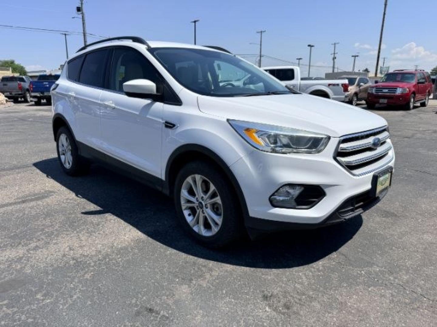 2018 WHITE /Medium Light Stone Ford Escape (1FMCU9HD1JU) with an EcoBoost 15L I-4 gasoline direct injection engine, Automatic transmission, located at 1175 N Woodruff Ave, Idaho Falls, ID, 83401, 43.506901, -111.999657 - At Timberline Auto, finding a great deal on your next vehicle is always easy! Our experienced sales staff goal is to help find you the right vehicle at the right price! Our knowledgeable finance department has options for almost any credit score. We offer extended service contract options to prot- Photo#38