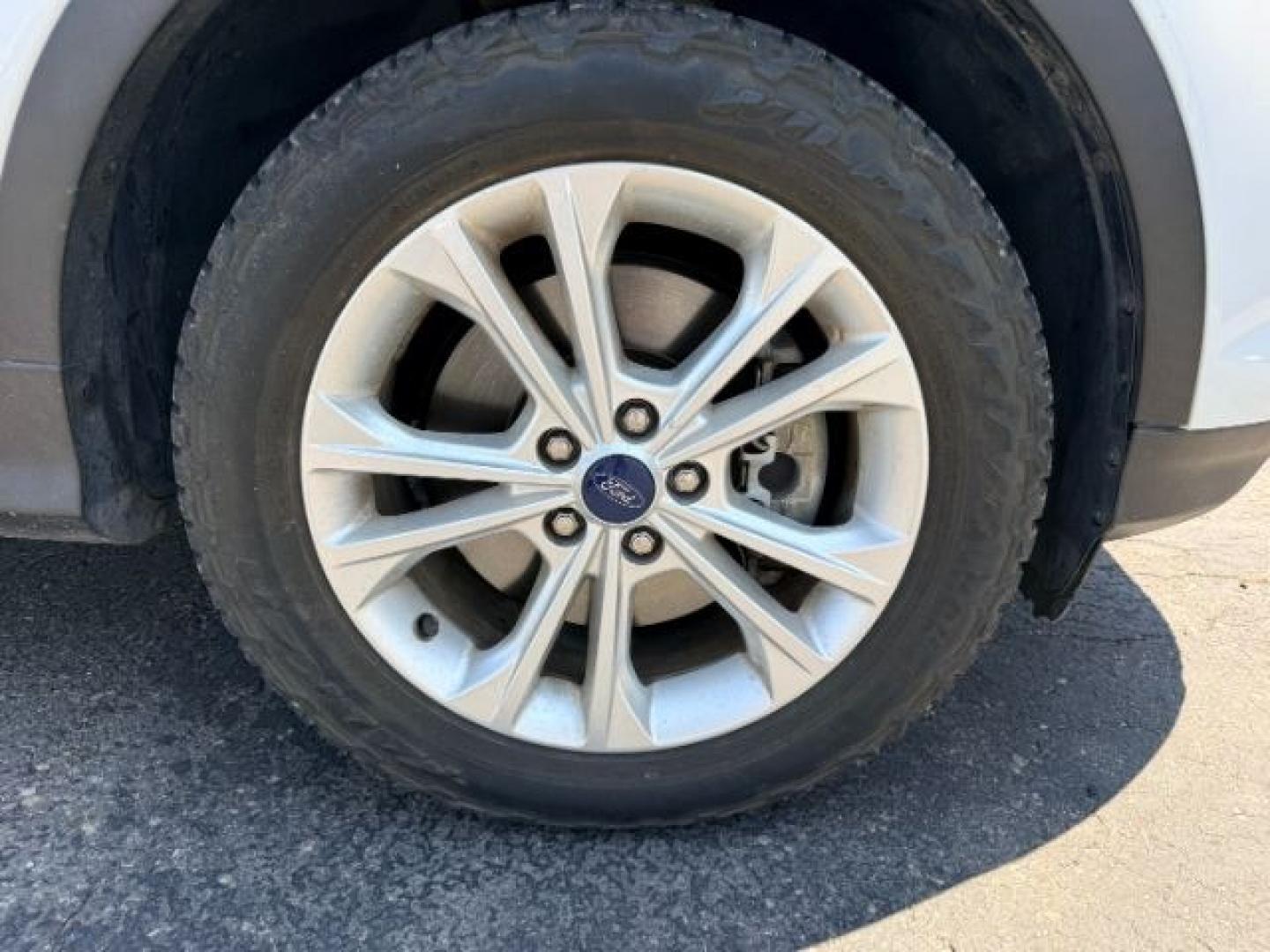 2018 WHITE /Medium Light Stone Ford Escape (1FMCU9HD1JU) with an EcoBoost 15L I-4 gasoline direct injection engine, Automatic transmission, located at 1175 N Woodruff Ave, Idaho Falls, ID, 83401, 43.506901, -111.999657 - At Timberline Auto, finding a great deal on your next vehicle is always easy! Our experienced sales staff goal is to help find you the right vehicle at the right price! Our knowledgeable finance department has options for almost any credit score. We offer extended service contract options to prot- Photo#41