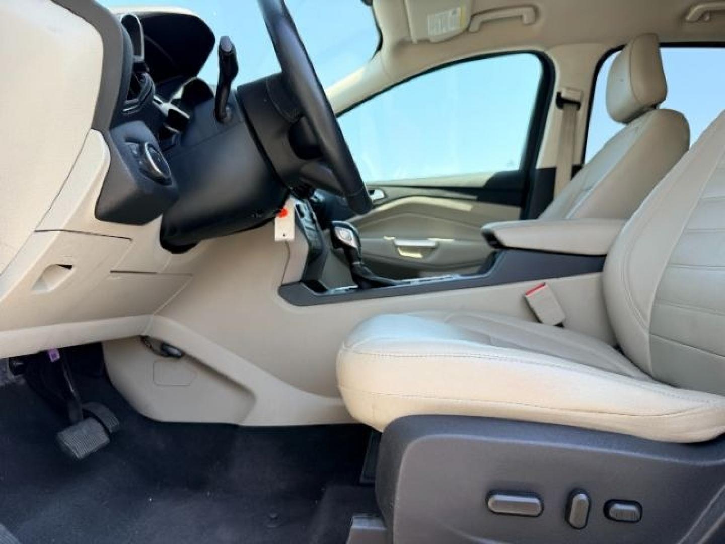 2018 WHITE /Medium Light Stone Ford Escape (1FMCU9HD1JU) with an EcoBoost 15L I-4 gasoline direct injection engine, Automatic transmission, located at 1175 N Woodruff Ave, Idaho Falls, ID, 83401, 43.506901, -111.999657 - At Timberline Auto, finding a great deal on your next vehicle is always easy! Our experienced sales staff goal is to help find you the right vehicle at the right price! Our knowledgeable finance department has options for almost any credit score. We offer extended service contract options to prot- Photo#43