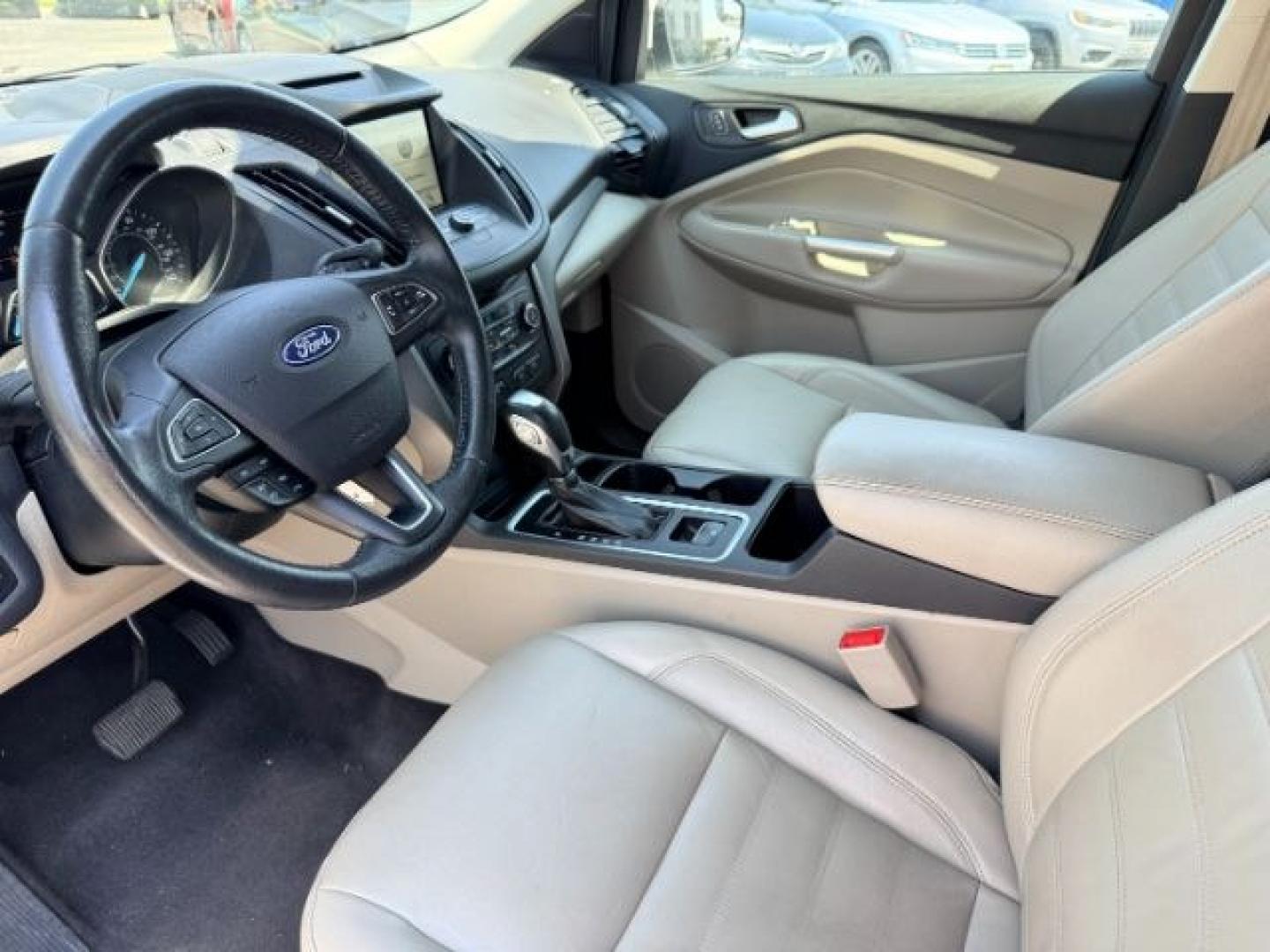 2018 WHITE /Medium Light Stone Ford Escape (1FMCU9HD1JU) with an EcoBoost 15L I-4 gasoline direct injection engine, Automatic transmission, located at 1175 N Woodruff Ave, Idaho Falls, ID, 83401, 43.506901, -111.999657 - At Timberline Auto, finding a great deal on your next vehicle is always easy! Our experienced sales staff goal is to help find you the right vehicle at the right price! Our knowledgeable finance department has options for almost any credit score. We offer extended service contract options to prot- Photo#44