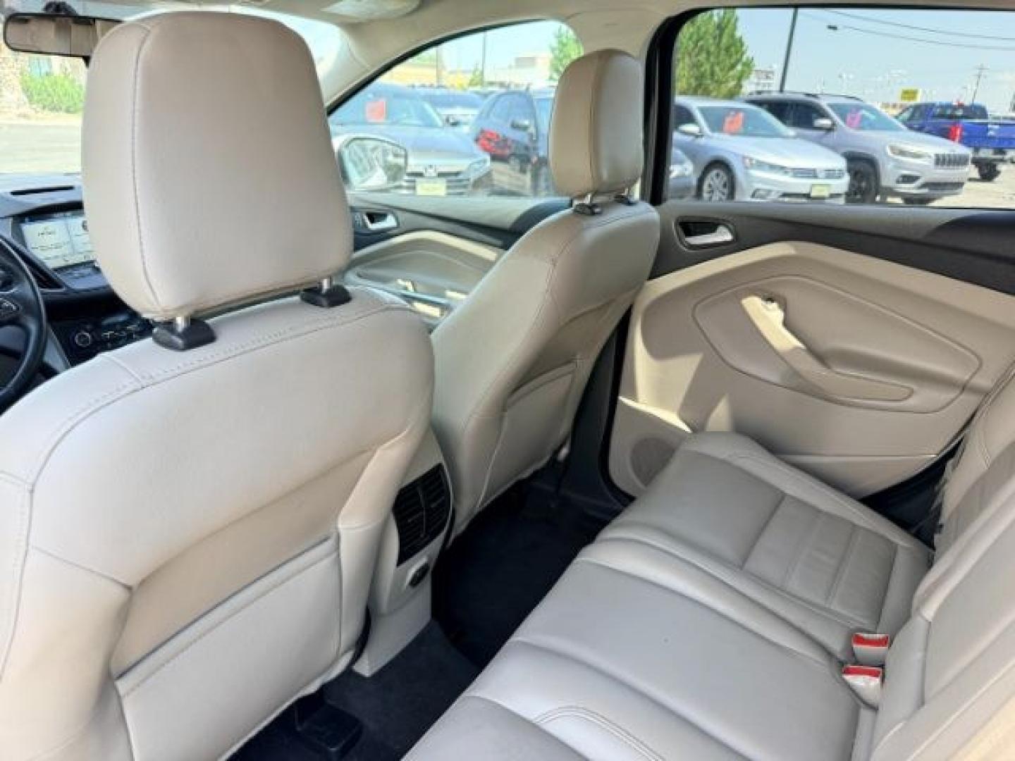 2018 WHITE /Medium Light Stone Ford Escape (1FMCU9HD1JU) with an EcoBoost 15L I-4 gasoline direct injection engine, Automatic transmission, located at 1175 N Woodruff Ave, Idaho Falls, ID, 83401, 43.506901, -111.999657 - At Timberline Auto, finding a great deal on your next vehicle is always easy! Our experienced sales staff goal is to help find you the right vehicle at the right price! Our knowledgeable finance department has options for almost any credit score. We offer extended service contract options to prot- Photo#54