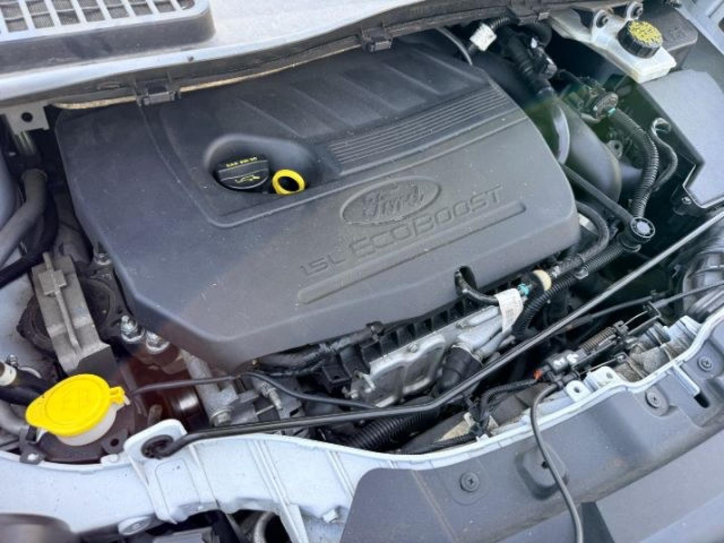 2018 WHITE /Medium Light Stone Ford Escape (1FMCU9HD1JU) with an EcoBoost 15L I-4 gasoline direct injection engine, Automatic transmission, located at 1175 N Woodruff Ave, Idaho Falls, ID, 83401, 43.506901, -111.999657 - At Timberline Auto, finding a great deal on your next vehicle is always easy! Our experienced sales staff goal is to help find you the right vehicle at the right price! Our knowledgeable finance department has options for almost any credit score. We offer extended service contract options to prot- Photo#55
