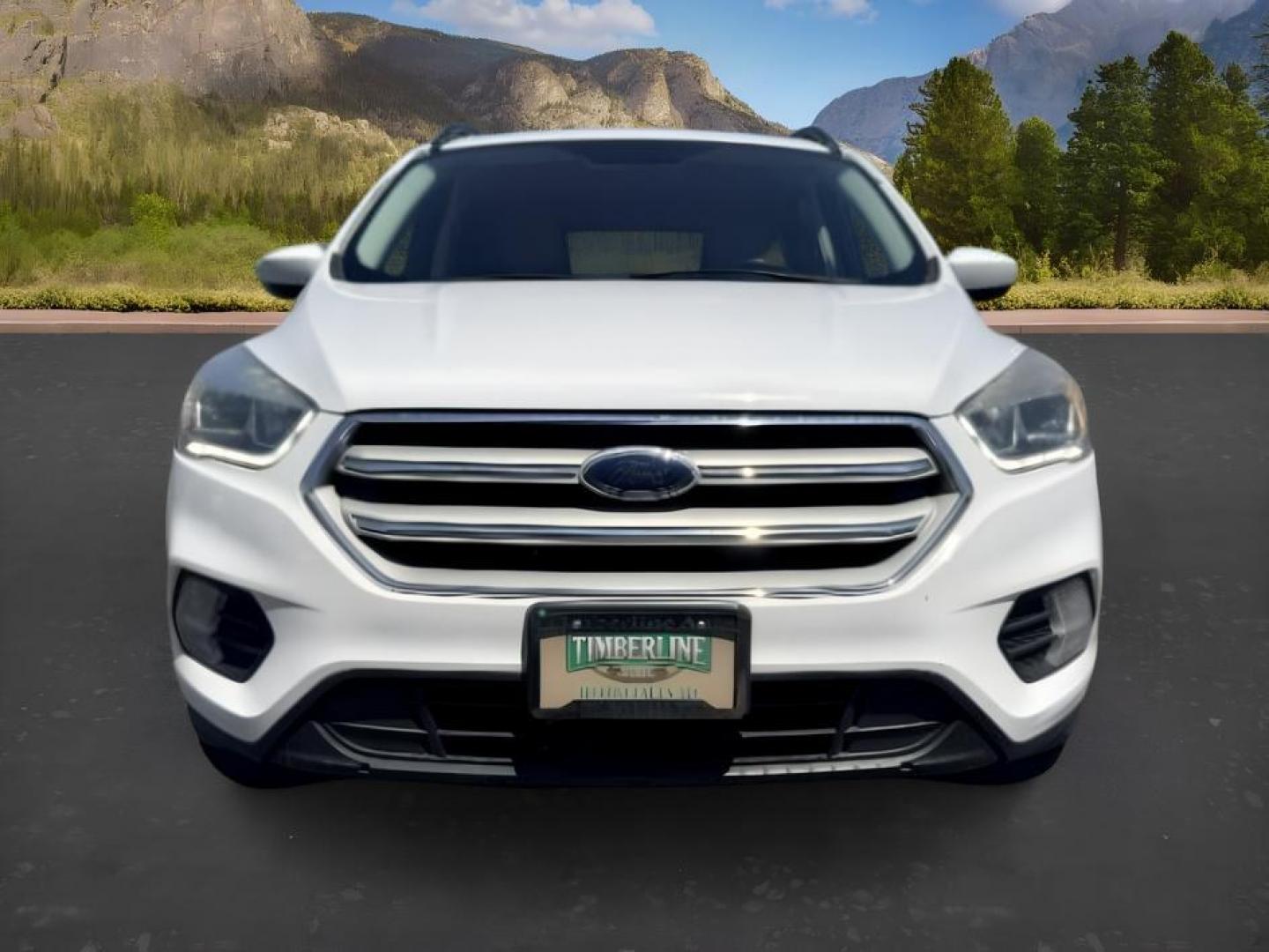 2018 WHITE /Medium Light Stone Ford Escape (1FMCU9HD1JU) with an EcoBoost 15L I-4 gasoline direct injection engine, Automatic transmission, located at 1175 N Woodruff Ave, Idaho Falls, ID, 83401, 43.506901, -111.999657 - At Timberline Auto, finding a great deal on your next vehicle is always easy! Our experienced sales staff goal is to help find you the right vehicle at the right price! Our knowledgeable finance department has options for almost any credit score. We offer extended service contract options to prot- Photo#11