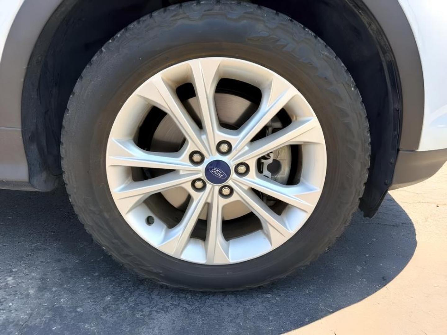 2018 WHITE /Medium Light Stone Ford Escape (1FMCU9HD1JU) with an EcoBoost 15L I-4 gasoline direct injection engine, Automatic transmission, located at 1175 N Woodruff Ave, Idaho Falls, ID, 83401, 43.506901, -111.999657 - At Timberline Auto, finding a great deal on your next vehicle is always easy! Our experienced sales staff goal is to help find you the right vehicle at the right price! Our knowledgeable finance department has options for almost any credit score. We offer extended service contract options to prot- Photo#13