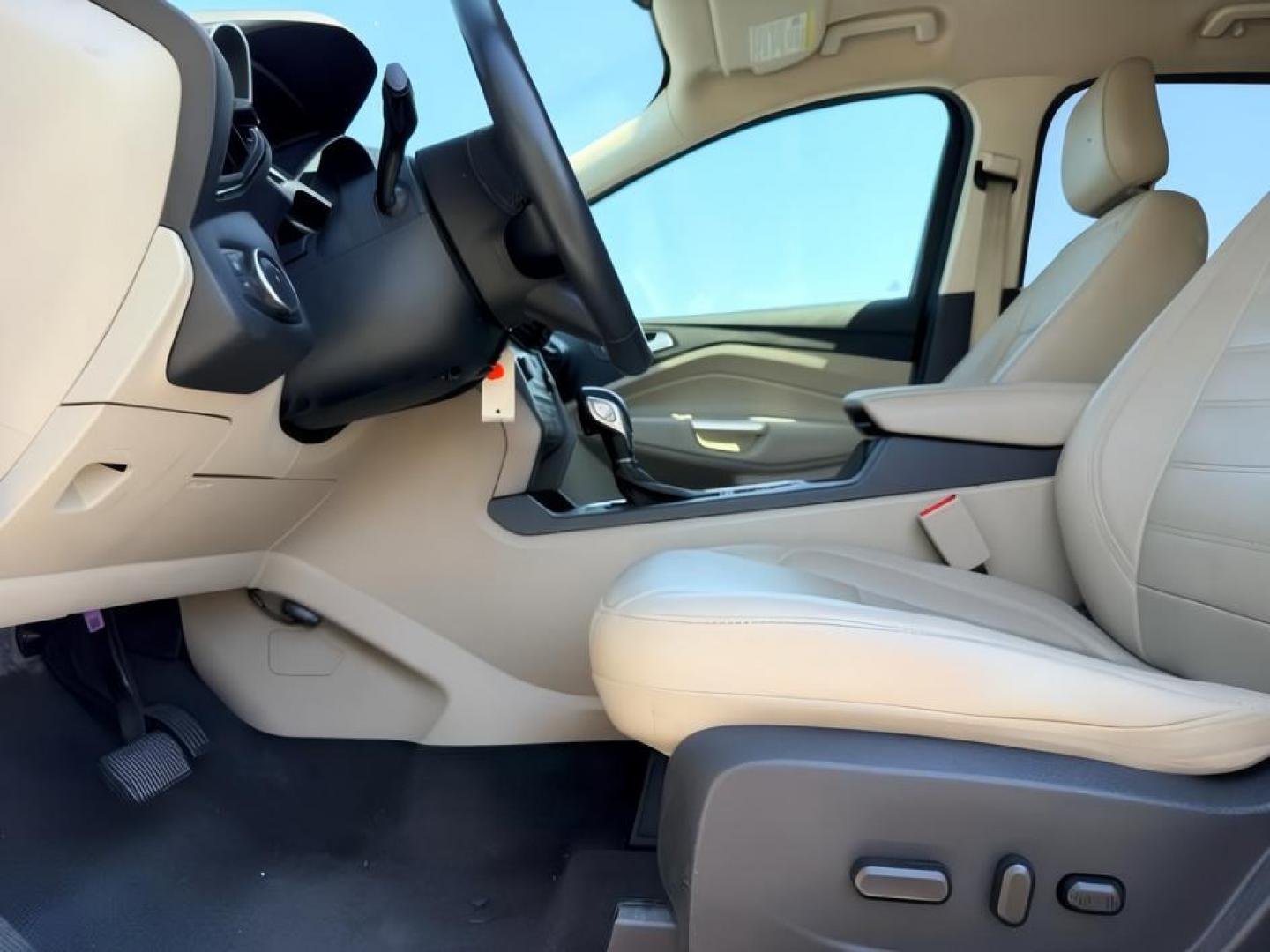 2018 WHITE /Medium Light Stone Ford Escape (1FMCU9HD1JU) with an EcoBoost 15L I-4 gasoline direct injection engine, Automatic transmission, located at 1175 N Woodruff Ave, Idaho Falls, ID, 83401, 43.506901, -111.999657 - At Timberline Auto, finding a great deal on your next vehicle is always easy! Our experienced sales staff goal is to help find you the right vehicle at the right price! Our knowledgeable finance department has options for almost any credit score. We offer extended service contract options to prot- Photo#15