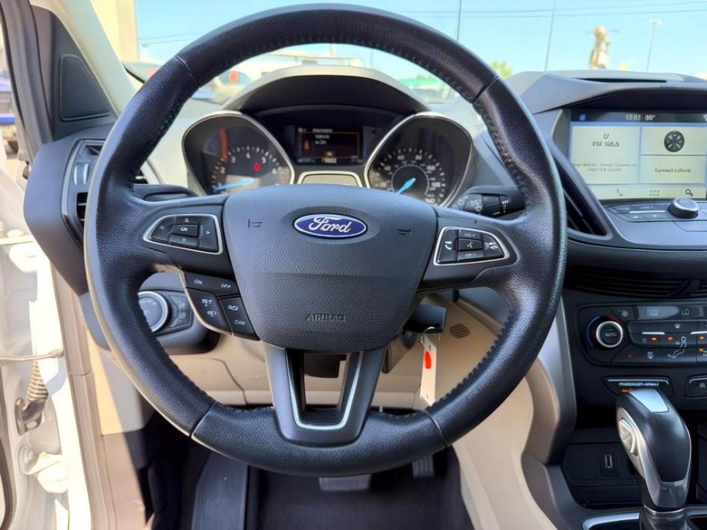 2018 WHITE /Medium Light Stone Ford Escape (1FMCU9HD1JU) with an EcoBoost 15L I-4 gasoline direct injection engine, Automatic transmission, located at 1175 N Woodruff Ave, Idaho Falls, ID, 83401, 43.506901, -111.999657 - At Timberline Auto, finding a great deal on your next vehicle is always easy! Our experienced sales staff goal is to help find you the right vehicle at the right price! Our knowledgeable finance department has options for almost any credit score. We offer extended service contract options to prot- Photo#17