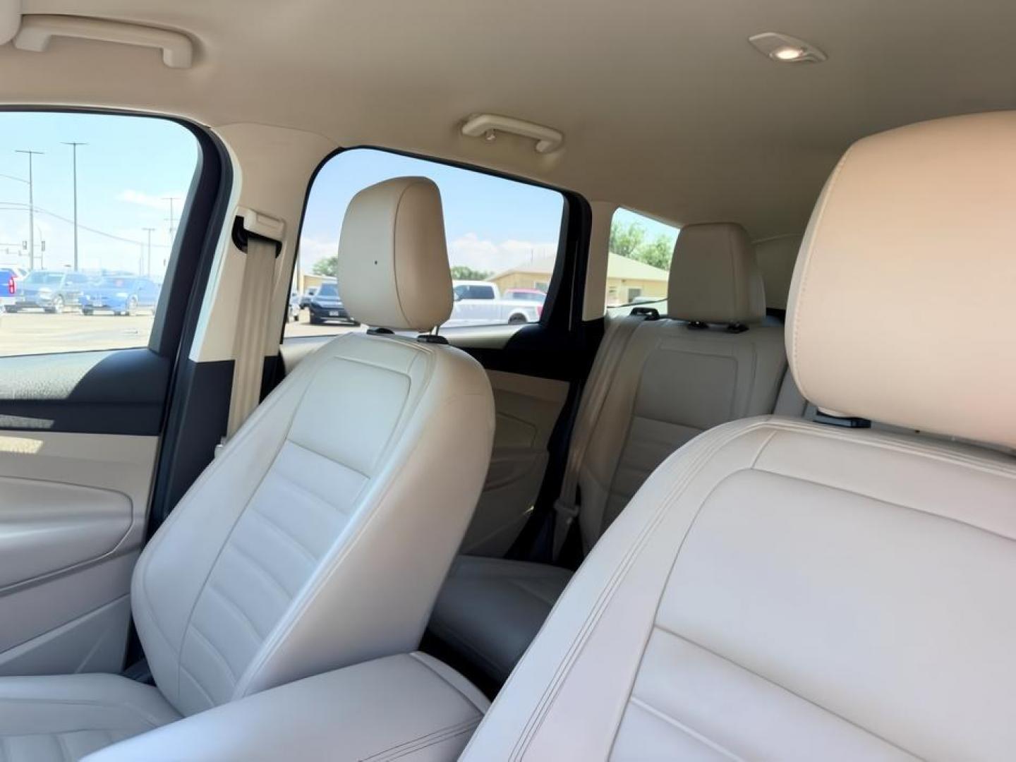 2018 WHITE /Medium Light Stone Ford Escape (1FMCU9HD1JU) with an EcoBoost 15L I-4 gasoline direct injection engine, Automatic transmission, located at 1175 N Woodruff Ave, Idaho Falls, ID, 83401, 43.506901, -111.999657 - At Timberline Auto, finding a great deal on your next vehicle is always easy! Our experienced sales staff goal is to help find you the right vehicle at the right price! Our knowledgeable finance department has options for almost any credit score. We offer extended service contract options to prot- Photo#23