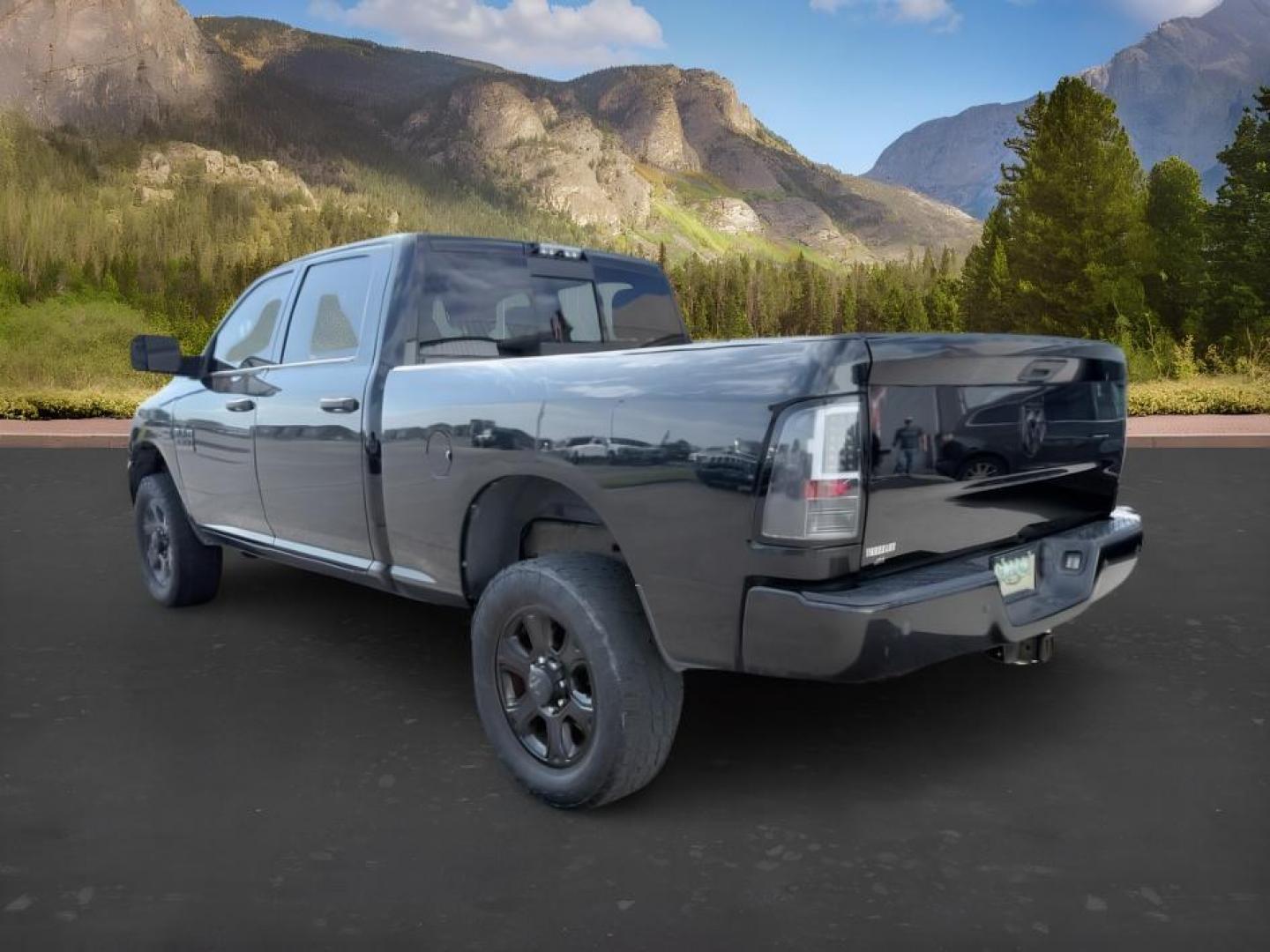 2016 BLACK /Diesel Gray/Black Ram 2500 (3C6UR5DJ7GG) with an HEMI 64L V-8 VVT variable valve control engine, Automatic transmission, located at 1175 N Woodruff Ave, Idaho Falls, ID, 83401, 43.506901, -111.999657 - At Timberline Auto, finding a great deal on your next vehicle is always easy! Our experienced sales staff goal is to help find you the right vehicle at the right price! Our knowledgeable finance department has options for almost any credit score. We offer extended service contract options to prot- Photo#2