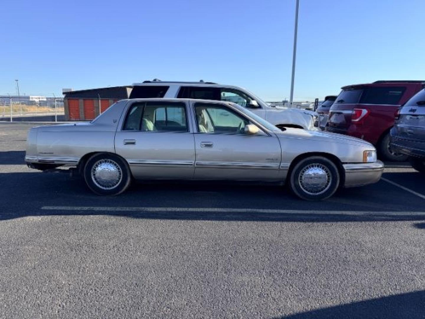 1997 BEIGE /LEATHER Cadillac d3939Elegance (1G6KE54Y8VU) with an 46L V8 engine, Automatic transmission, located at 1175 N Woodruff Ave, Idaho Falls, ID, 83401, 43.506901, -111.999657 - At Timberline Auto, finding a great deal on your next vehicle is always easy! Our experienced sales staff goal is to help find you the right vehicle at the right price! Our knowledgeable finance department has options for almost any credit score. We offer extended service contract options to prot- Photo#1