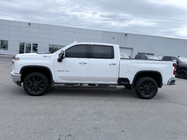 2023 Summit White /Jet Black Chevrolet Silverado LTZ (2GC4YUEY5P1) with an V8, 6.6L engine, 10-speed automatic transmission, located at 1175 N Woodruff Ave, Idaho Falls, ID, 83401, 43.506901, -111.999657 - <b>Vehicle Details</b><br>Drive home capability and luxury in this pre-owned 2023 Chevrolet Silverado 3500 LTZ 4WD, now available in Idaho Falls, ID. Powered by a V8 6.6L Diesel engine, this heavy-duty pickup is built for demanding jobs, towing, and confident year-round driving. The Chevrolet Silver- Photo#55