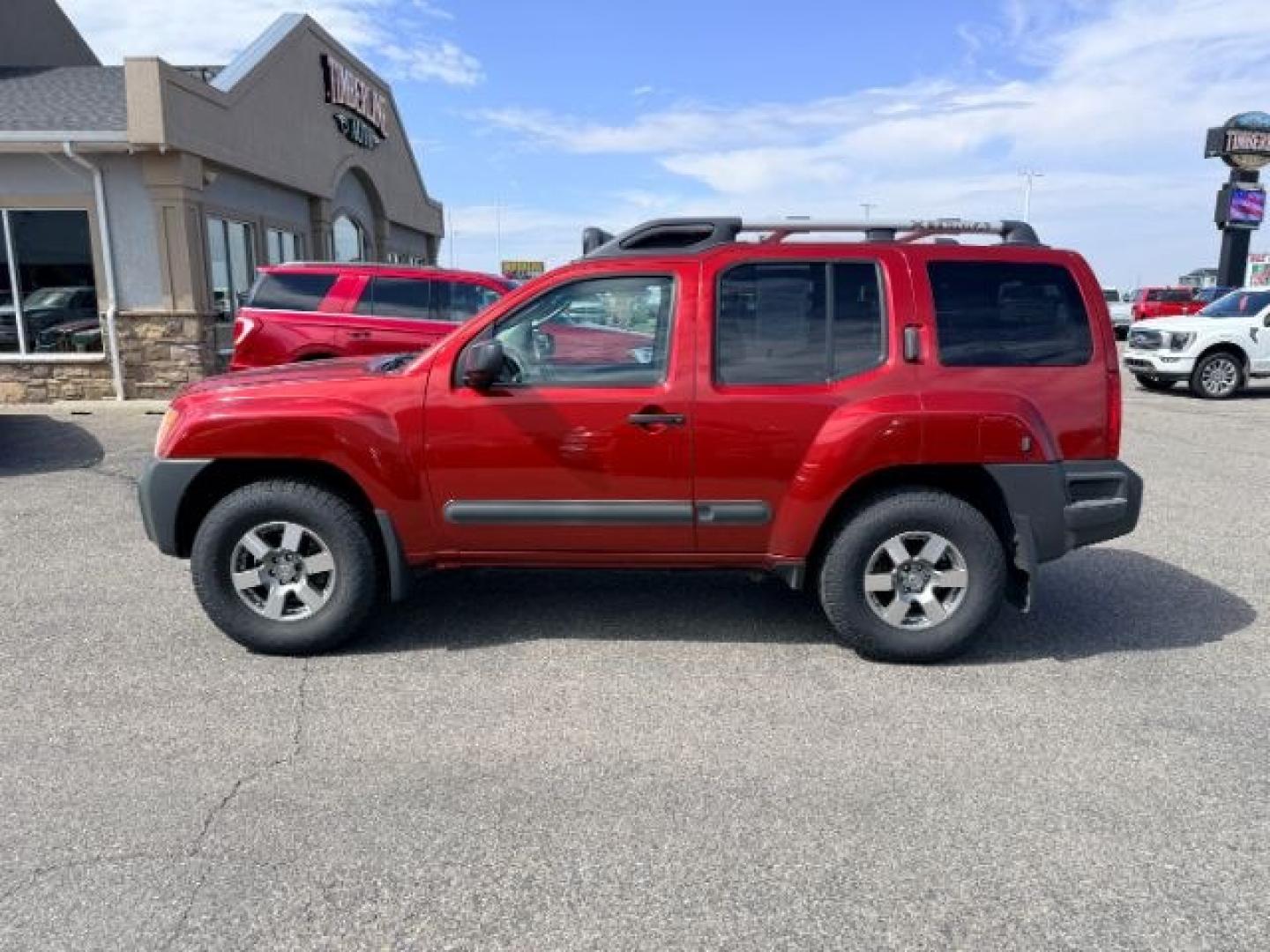2012 RED /Gray/Steel Nissan Xterra (5N1AN0NW5CC) with an VQ 4L V-6 DOHC engine, Automatic transmission, located at 1175 N Woodruff Ave, Idaho Falls, ID, 83401, 43.506901, -111.999657- Photo#25