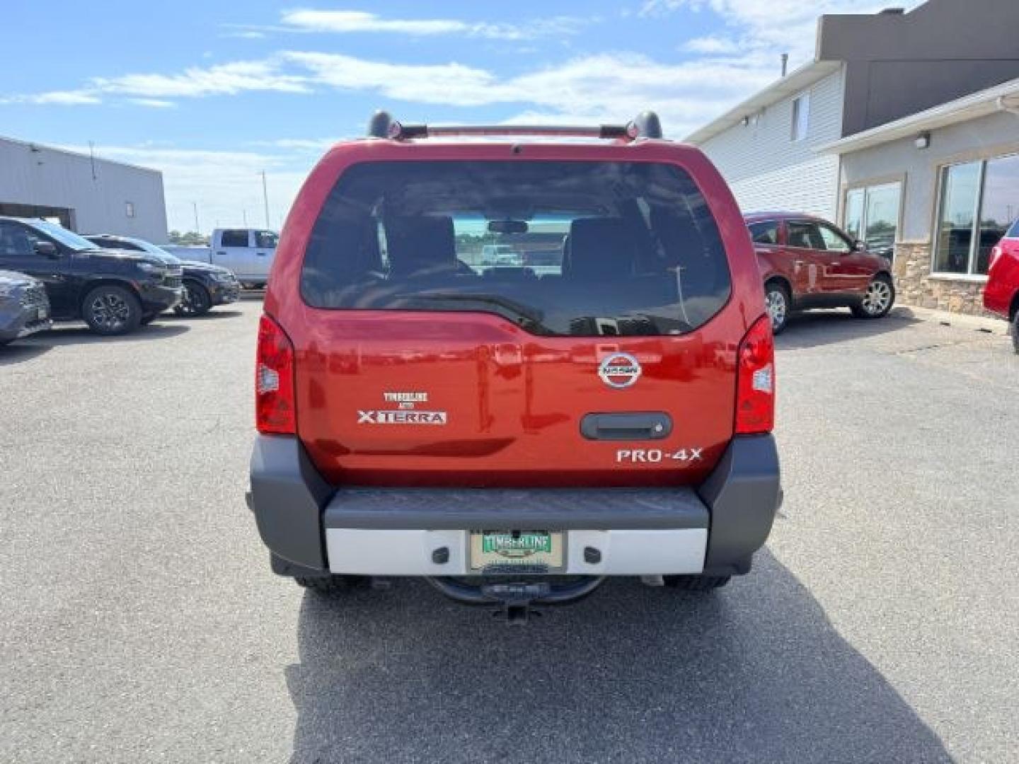 2012 RED /Gray/Steel Nissan Xterra (5N1AN0NW5CC) with an VQ 4L V-6 DOHC engine, Automatic transmission, located at 1175 N Woodruff Ave, Idaho Falls, ID, 83401, 43.506901, -111.999657- Photo#27