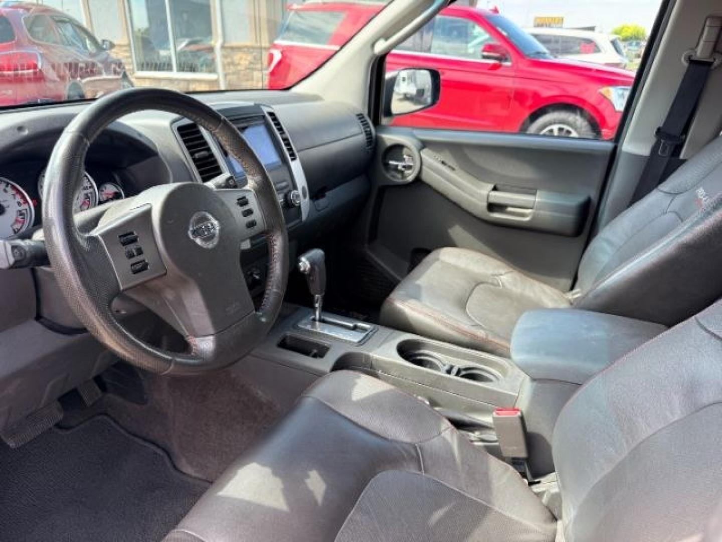 2012 RED /Gray/Steel Nissan Xterra (5N1AN0NW5CC) with an VQ 4L V-6 DOHC engine, Automatic transmission, located at 1175 N Woodruff Ave, Idaho Falls, ID, 83401, 43.506901, -111.999657- Photo#38