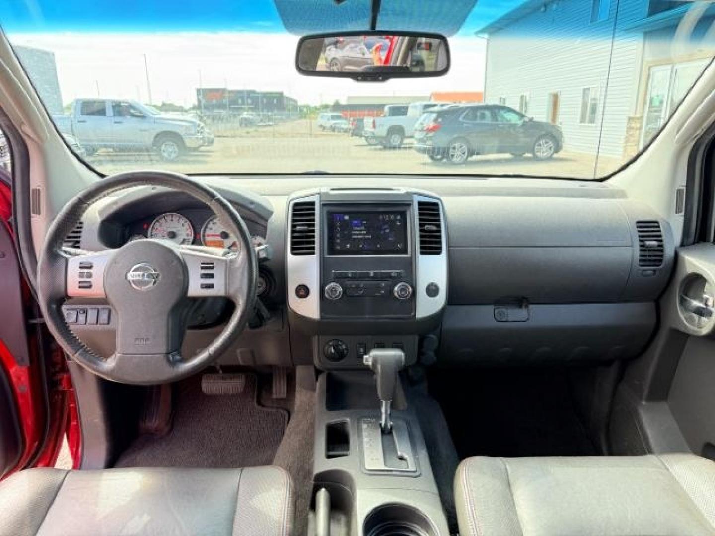 2012 RED /Gray/Steel Nissan Xterra (5N1AN0NW5CC) with an VQ 4L V-6 DOHC engine, Automatic transmission, located at 1175 N Woodruff Ave, Idaho Falls, ID, 83401, 43.506901, -111.999657- Photo#48