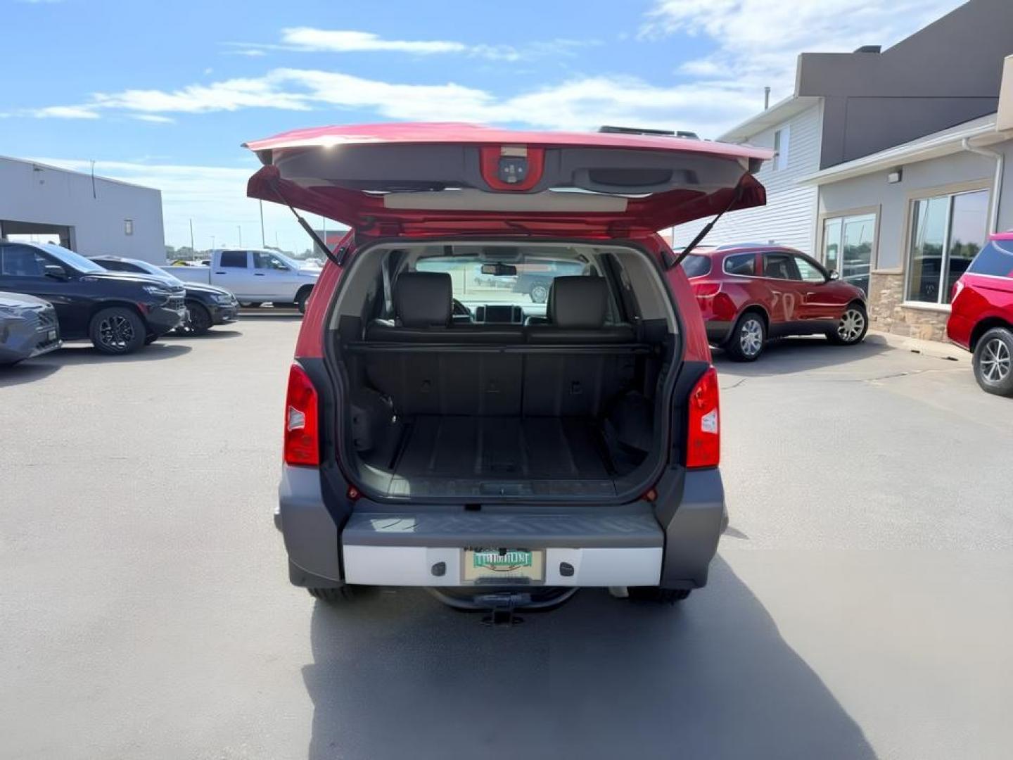 2012 RED /Gray/Steel Nissan Xterra (5N1AN0NW5CC) with an VQ 4L V-6 DOHC engine, Automatic transmission, located at 1175 N Woodruff Ave, Idaho Falls, ID, 83401, 43.506901, -111.999657- Photo#3