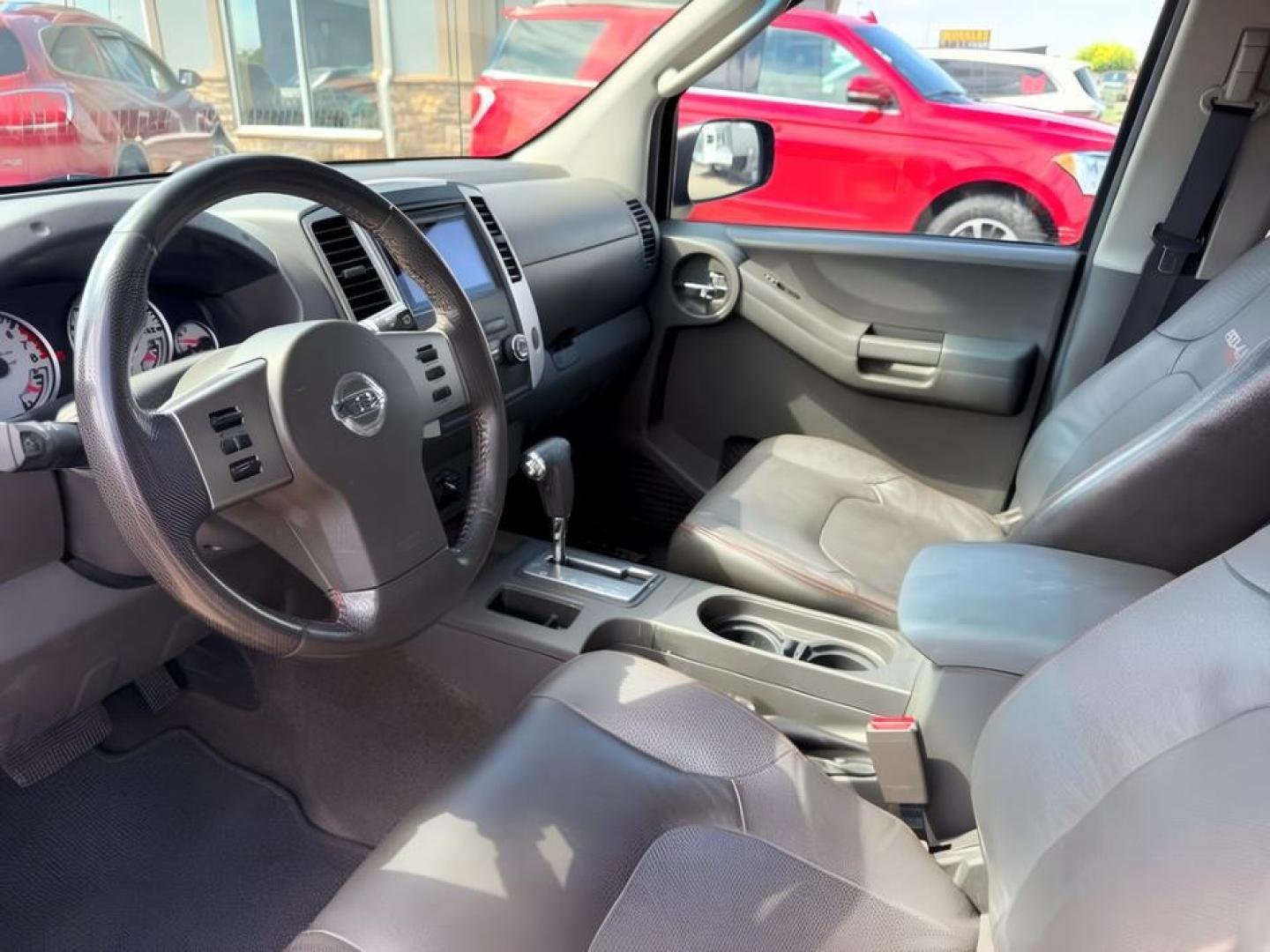 2012 RED /Gray/Steel Nissan Xterra (5N1AN0NW5CC) with an VQ 4L V-6 DOHC engine, Automatic transmission, located at 1175 N Woodruff Ave, Idaho Falls, ID, 83401, 43.506901, -111.999657- Photo#13